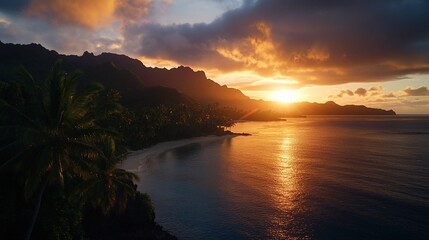 A stunning sunset over a tropical beach with palm trees and mountains.