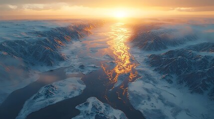 Fototapeta premium A breathtaking aerial view of a snowy landscape illuminated by the golden glow of sunset, reflecting on a winding river amidst majestic, icy mountains.