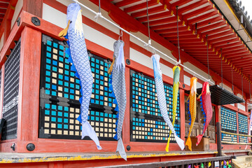 Flags in the shape of Koi carp on a building at Kiyomizu-dera Temple in Kyoto, Japan