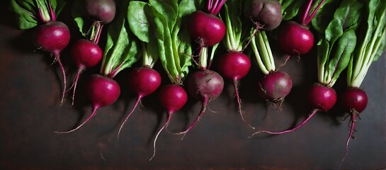 Beet root vegetable on dark. Top view, flat lay.