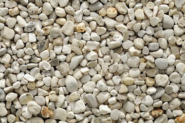 Photo of Pile of small pebble stones. Background texture for backdrops or mapping