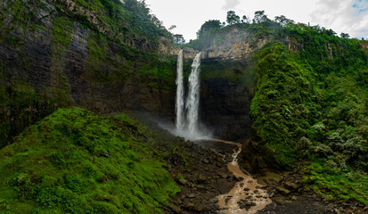 Aerial drone view of Coban Sriti waterfall, Indonesia waterfall in Malang, East Java, Indonesia