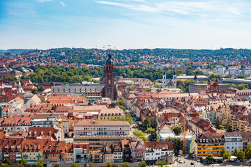 Fototapeta premium Neubaukirche is surrounded red tiled houses, Wurzburg, Germany
