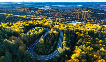Serpentine road in Slonne Mountains near Sanok, Poland © monticellllo