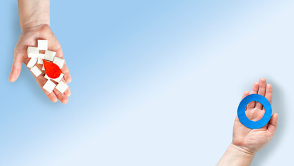 Sugar cubes, blood drop, blue circle in women's hands universal symbol of diabetes mellitus. World...