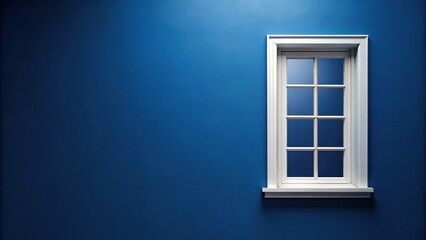 White window on dark blue wall, facade view