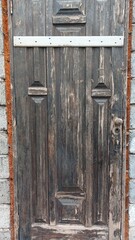 The old door has worn paint