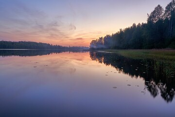 Serene lake sunset in Finland