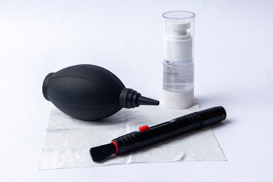 Purwakarta, West java - October 29 2024: electronic cleaning or cleaning kit, containing brushes, dusters, rags on white background