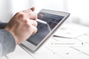 Man using a digital tablet