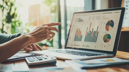 The Laptop with Data Charts