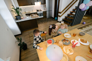 Family having a birthday party at home