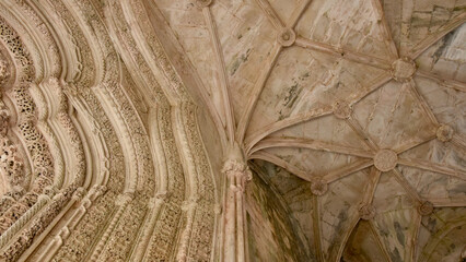 Layers of Intricately Detailed Arches, Frame Left, with High Vaulted Ceilings, Frame Right, in Portuguese Monastery