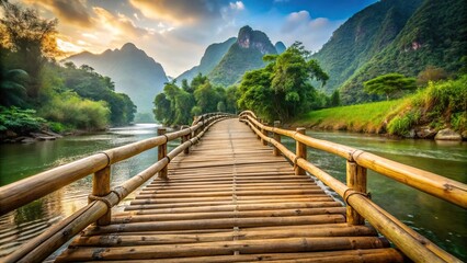 Fototapeta premium Wooden bamboo bridge over picturesque river with majestic mountain background