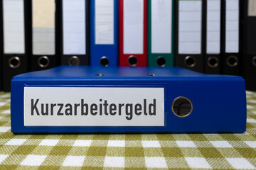 Aktenordner mit Aufschrift, Kurzarbeitergeld
