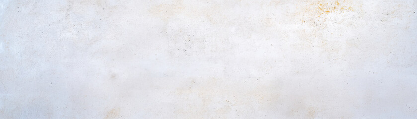 Naklejka premium A plain, textured wall with subtle variations in color and surface, creating a minimalistic and clean aesthetic ideal for backgrounds.