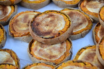 Rye tarte with carrot, potatoes and cumin in a wicker basket. Latvian dessert at Sklandrausis with carrot and rye dough
