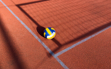 volleyball. blue with yellow color ball on the playground. volleyball cover, red. ball game