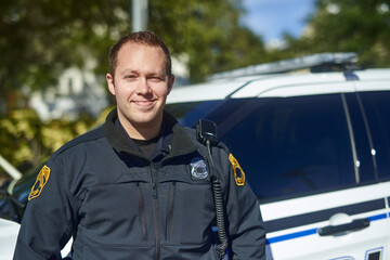 Man, portrait and brave officer on duty, outdoor and uniform for responsibility in urban city. Male...