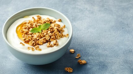 Fototapeta premium Delightful Top View of a Breakfast Bowl Filled with Creamy Yogurt Crunchy Granola and Drizzled Honey A Healthy Wholesome and Appetizing Morning Meal