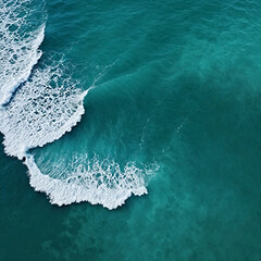 Fototapeta premium Aerial view beautiful of sea waves from drone. Stock image of blue color of ocean water, sea surface. Top view on turquoise waves, clear water surface texture. 