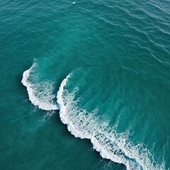 Aerial view beautiful of sea waves from drone. Stock image of blue color of ocean water, sea surface. Top view on turquoise waves, clear water surface texture.	
