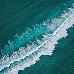 Fototapeta premium Aerial view beautiful of sea waves from drone. Stock image of blue color of ocean water, sea surface. Top view on turquoise waves, clear water surface texture. 