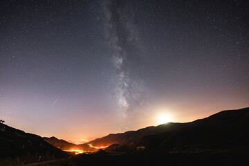 The moment the Milky Way and the moon set over a village in Turkey