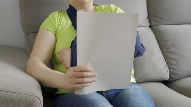 Woman reading letter of Injury and compensation paperwork, insurance, legal contract or lawyer consulting. Disability people, attorney or advocate in negotiation, policy advice or accident report.