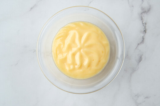 Top-down shot of bowl of custard aga