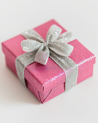 Glittering Romance: A pink gift box wrapped with sparkling silver ribbon