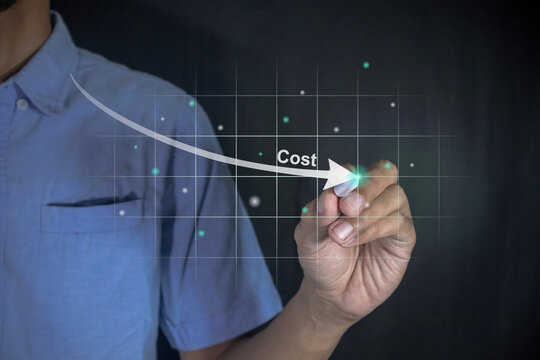 Man holding pen making a down arrow on virtual screen. Cost reduction concept.