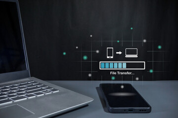 Transfer files from mobile phone to laptop. Backup, Copy file and media or exchange data concept.