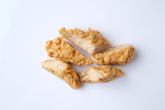 Cha Lua bite-sized slices on a white countertop.