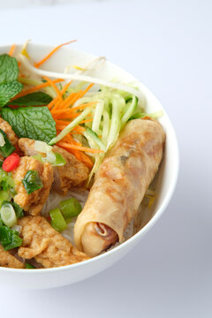 Bun Cha Gio bowl topped with fried spring roll and Cha Lua.