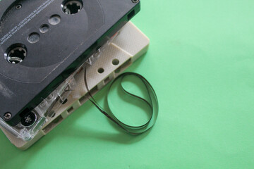 a cassette with a green background	