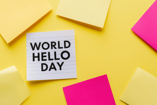 "World hello day" text on yellow background. November 21. AI generated