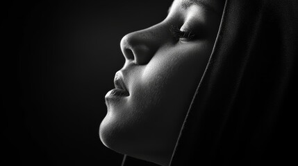 Woman's closed-eyed head in a veil