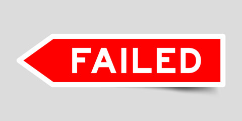 Red color arrow shape sticker label with word failed on gray background