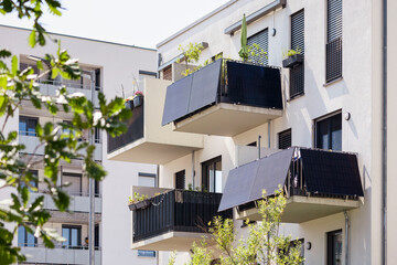 Solar Panels Balcony of Modern Exterior Design Building. High-rise Residential Building Apartment...