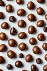 Fototapeta premium Chocolate Candies Arranged in a Pattern on a White Surface