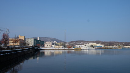 A quiet little village nestled by the calm lake