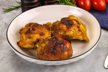 Roasted chicken thighs  with spices