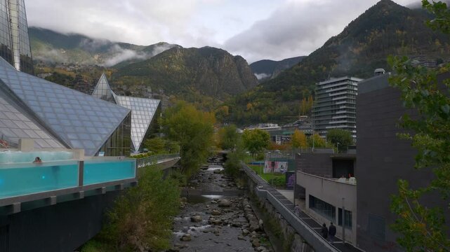 cloudy day andorra la vella famous spa complex swimming pool riverside slow motion panorama 4k andorra
