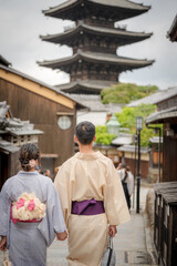 Obraz premium People wearing Yukata Kimono in Kyoto, Japan. Japanese traditional background.