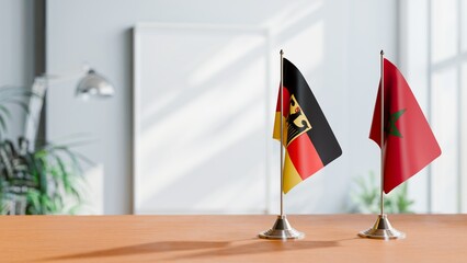 FLAGS OF GERMANY AND MOROCCO ON TABLE