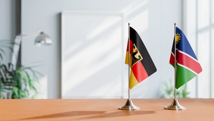 FLAGS OF GERMANY AND NAMIBIA ON TABLE