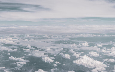 Fototapeta premium Flying in airplane view of blue sky and clouds Thailand.