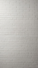 Obraz premium Classic white brick wall with even texture, ideal for minimalist backgrounds with a clean, modern look and open copy space.