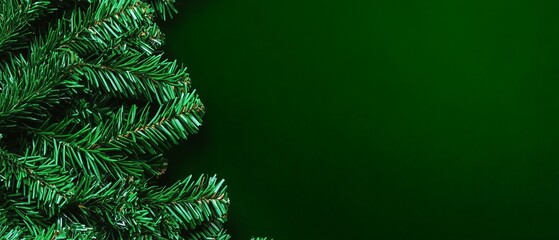 A green Christmas tree with green leaves